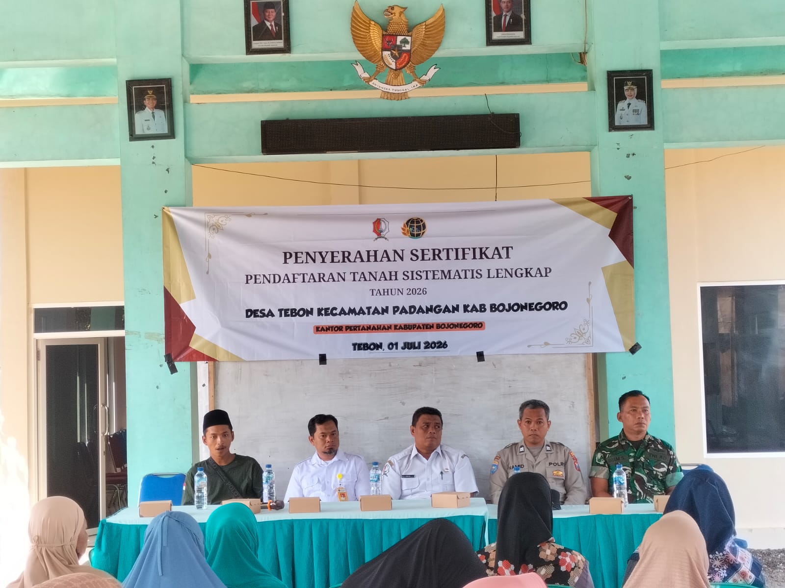 Polsek Padangan Hadiri Penyerahan Sertifikat Tanah Program PTSL di Desa Tebon